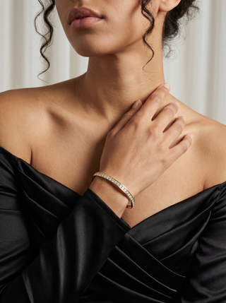Classic Diamond Channel Bangle – 18K Yellow Gold