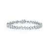 Round, Marquise, Pear, Oval & Princess Cut Tennis Bracelet In White Gold